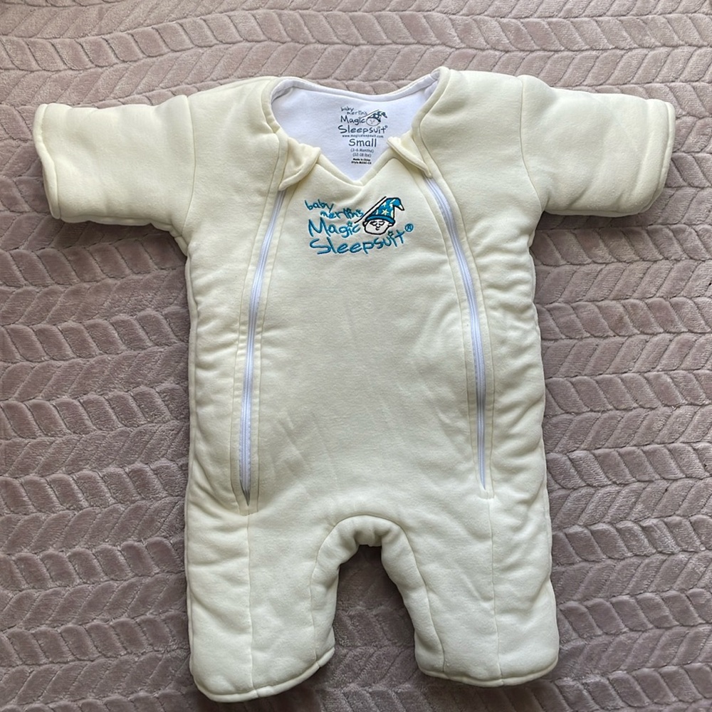 Baby Merlin’s Magic Sleepsuit 100% cotton in the color cream - Size SMALL
